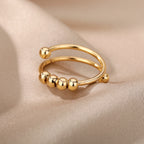 bague-anti-stress-tournante-a-perles-ajustable-ouverte-or-situation